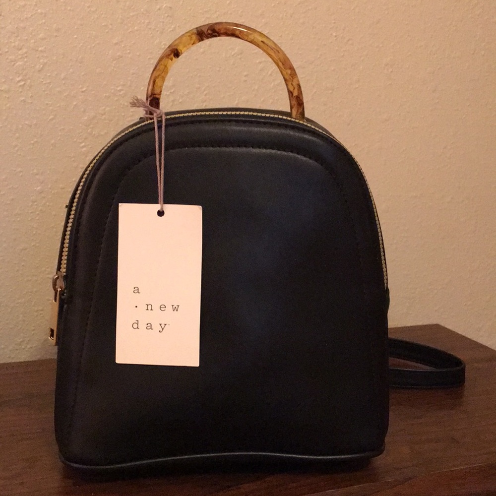 Woman’s mini backpack.